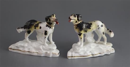 A pair of Staffordshire porcelain figures of Newfoundlands, c.1835-50, L. 11.5cm